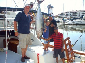 Stephen and Mathias Trihey (9 yrs) Yellowfin Tuna on Magnifico