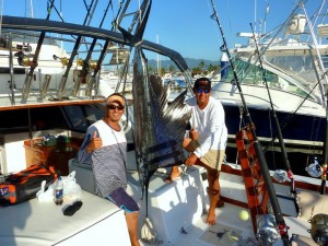 Sailfish at Cabo Corrientes. Pictured is First Mate Lobo and Capt. Cesar from Magnifico, one of the finest sportfishing boats in all of Puerto Vallarta!